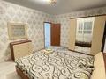 2-комнатная квартира, 65 м², 1/5 этаж посуточно, Каратал мкр 44 б за 10 000 〒 в Талдыкоргане — фото 4